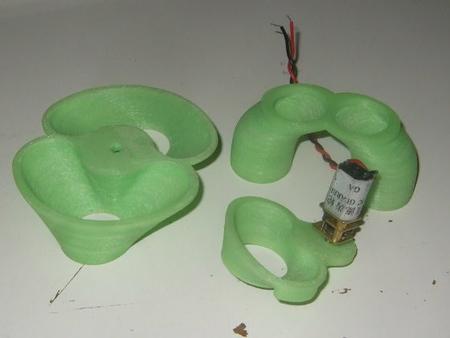 3D printed prototypes of the 1-to-2 and 1-to-3 sorter and a connection part.